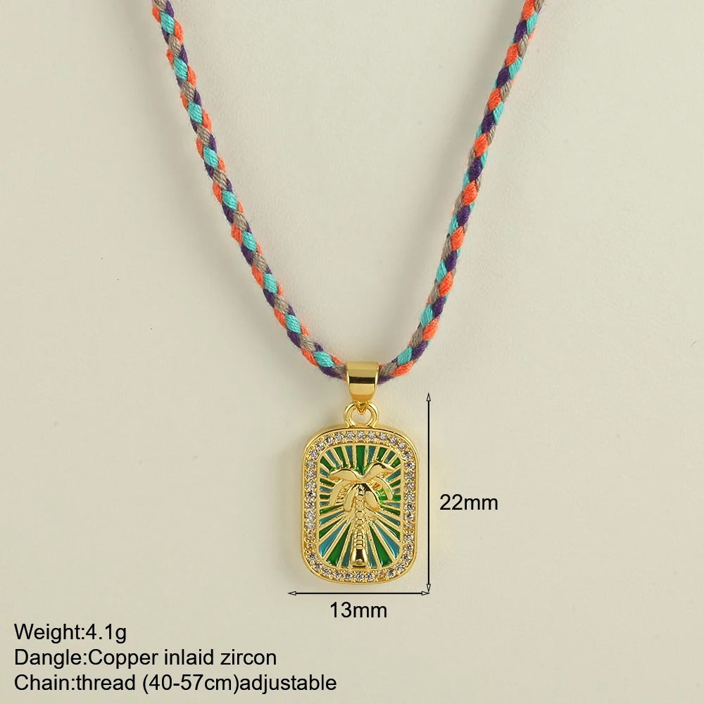 Collier tissé à la main avec pendentif en cuivre et zircone