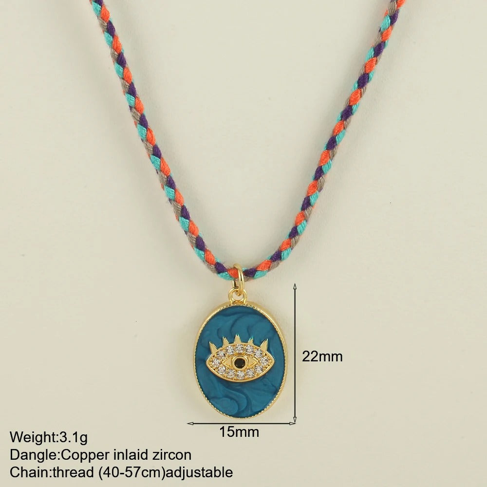 Collier tissé à la main avec pendentif en cuivre et zircone